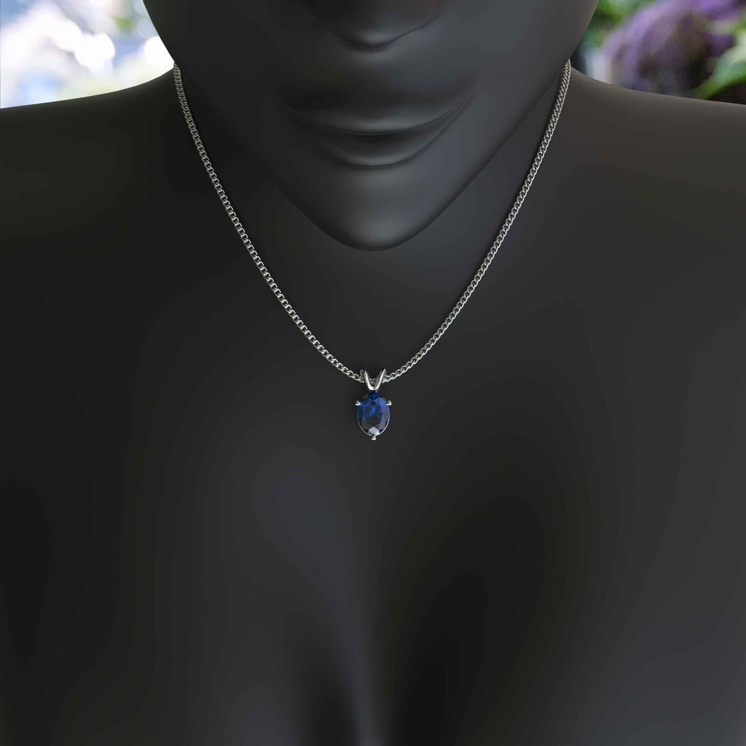 Blue Mystic: Unveiling the Oval Cut London Blue Topaz Solitaire Pendant Necklace Elegance