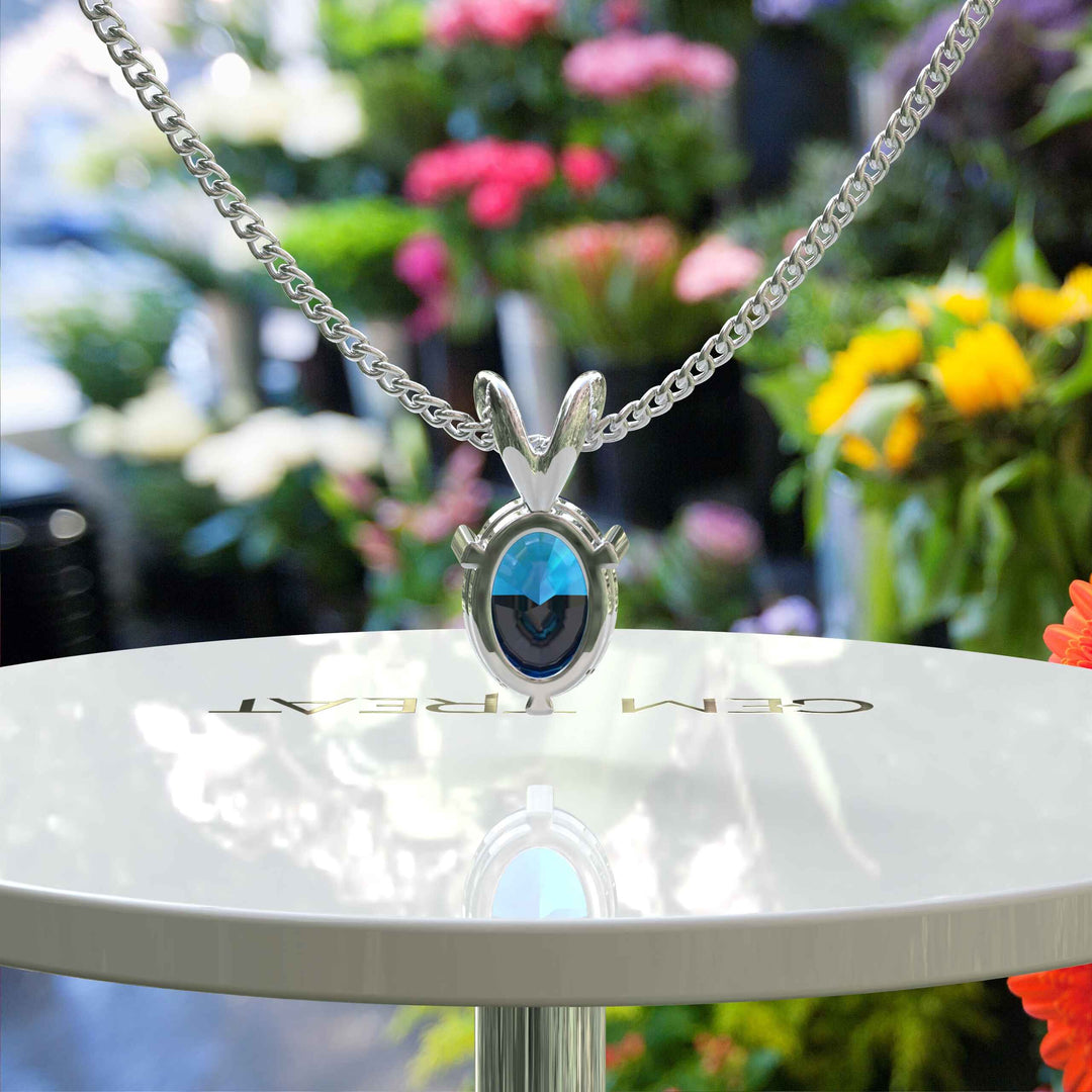 Blue Mystic: Unveiling the Oval Cut London Blue Topaz Solitaire Pendant Necklace Elegance