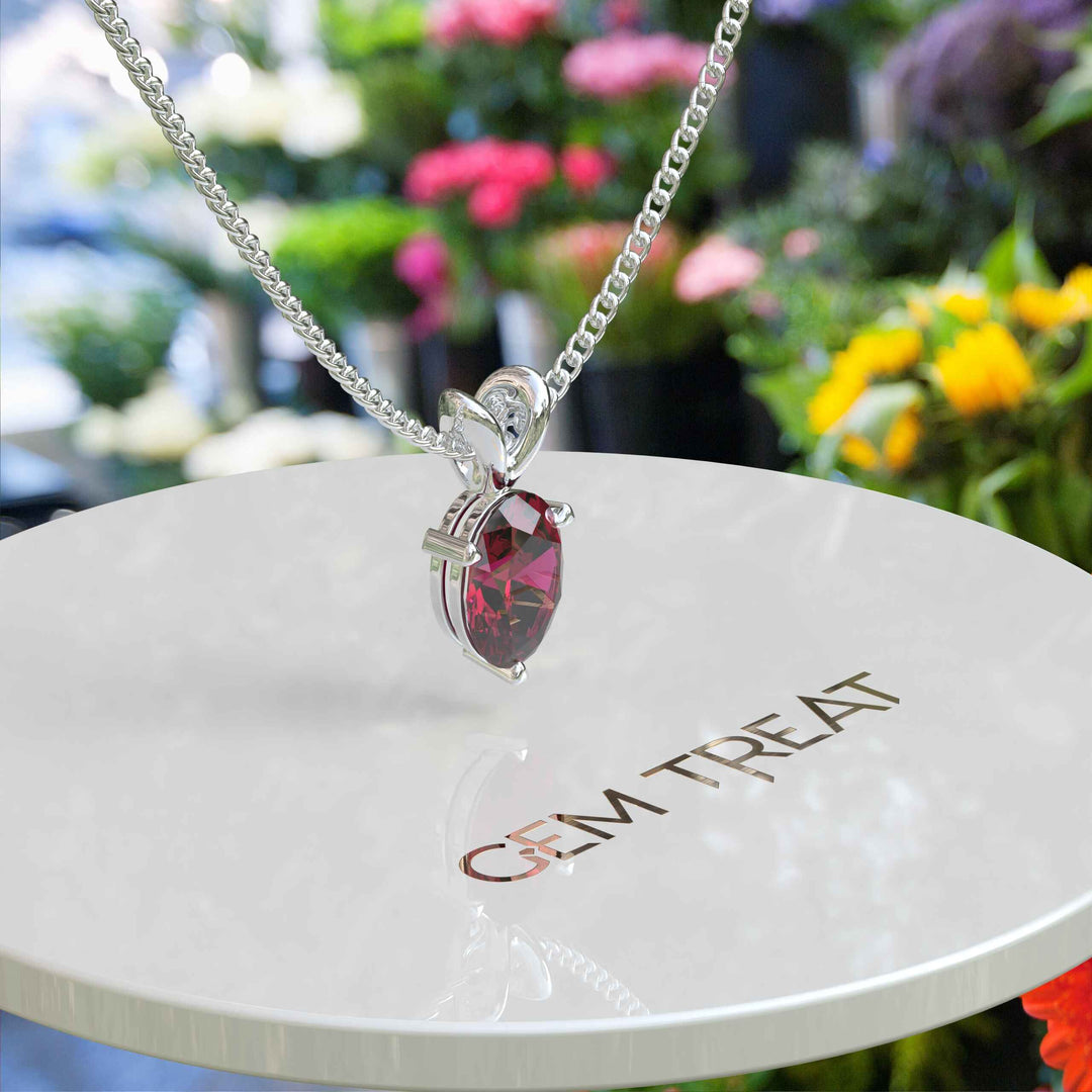 Vivid Radiance: A Captivating Oval Ruby Solitaire Pendant Necklace, A Celebration of Color