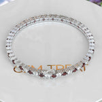 Load image into Gallery viewer, Fire and Ice Elegance, 3.5mm Garnet Tennis Bracelet Entwined with White Moissanite
