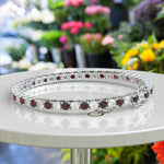 Load image into Gallery viewer, Fire and Ice Elegance, 3.5mm Garnet Tennis Bracelet Entwined with White Moissanite
