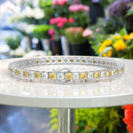 Load image into Gallery viewer, 3.5mm Round Yellow Sapphire Tennis Bracelet Featuring Alternating White Moissanite
