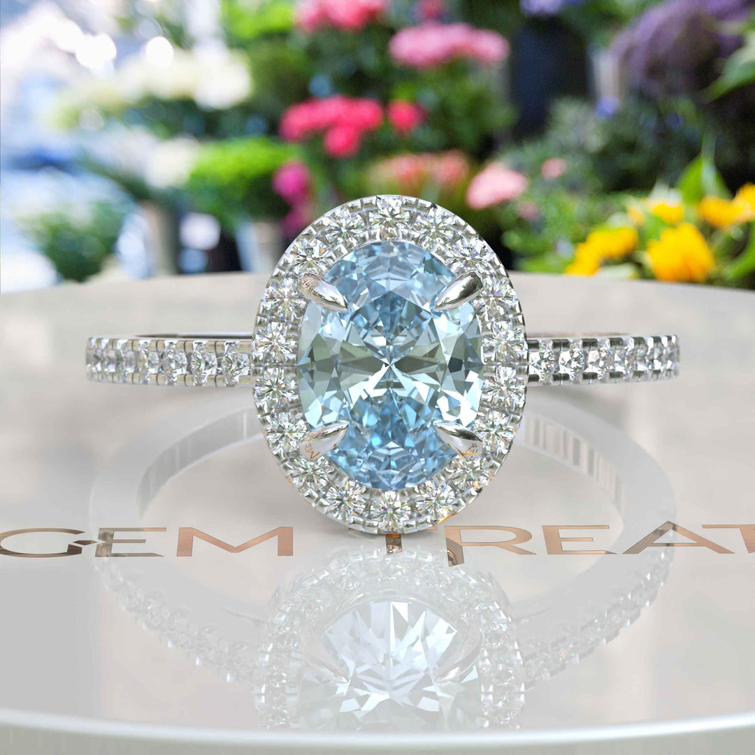 Bridal Elegance in Sea Tones: Oval Aquamarine Halo Engagement Ring's Ethereal Beauty