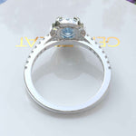 Load image into Gallery viewer, Bridal Elegance in Sea Tones: Oval Aquamarine Halo Engagement Ring&#39;s Ethereal Beauty
