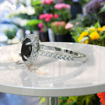 Load image into Gallery viewer, Dark Allure: Lustrous Silver Ring with Oval Black Onyx Centerpiece, Accented by Radiant Moissanites
