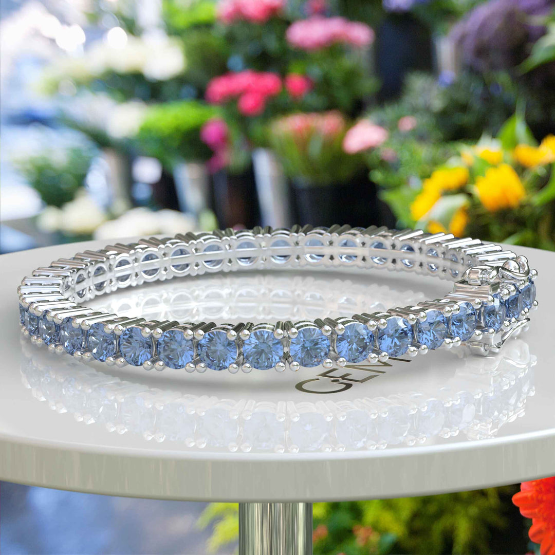 Lustrous Waves: A 16.0ct, 5.0mm Blue Moissanite Tennis Bracelet Marvel