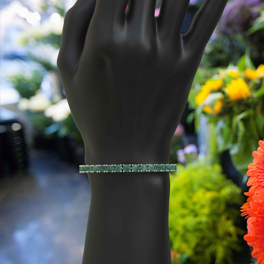 Nature's Elegance: A Stunning Tennis Bracelet with 16.0ct Round Moss Agate