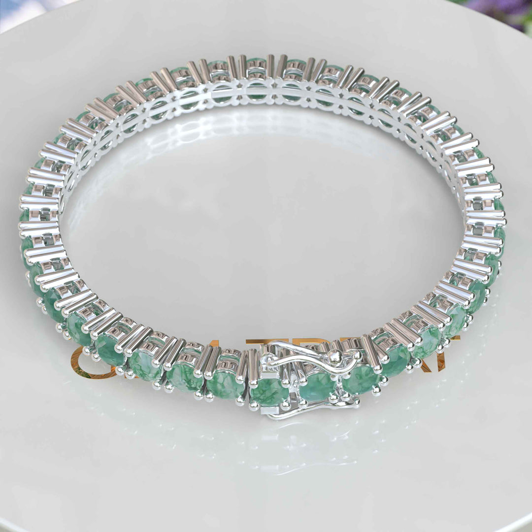 Nature's Elegance: A Stunning Tennis Bracelet with 16.0ct Round Moss Agate