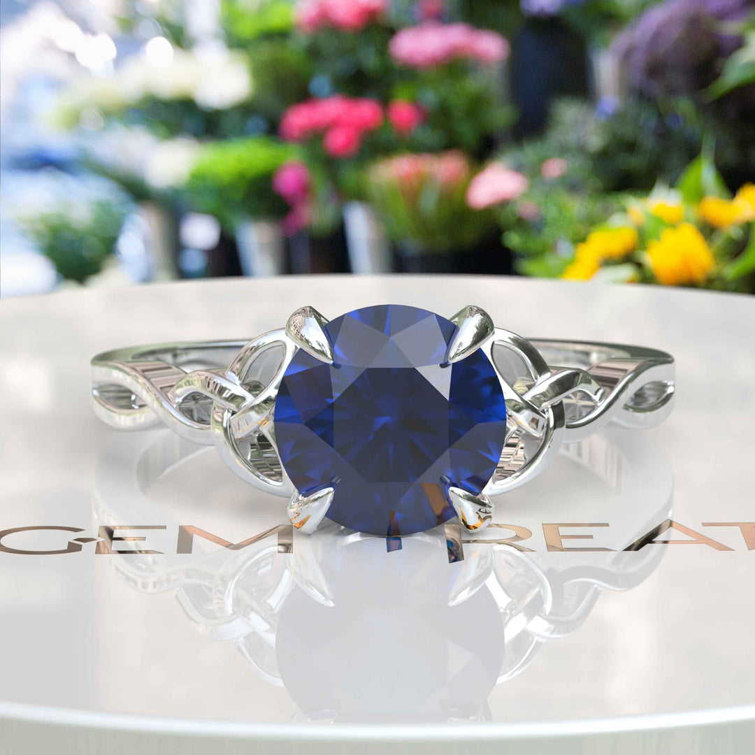 Dive into Timeless Beauty: Round London Blue Topaz Celtic Solitaire Ring's Enigmatic Charm