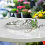 Load image into Gallery viewer, Green Gem Enigma: Round Peridot Solitaire in Celtic Silver Setting
