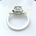 Load image into Gallery viewer, Green Gem Enigma: Round Peridot Solitaire in Celtic Silver Setting
