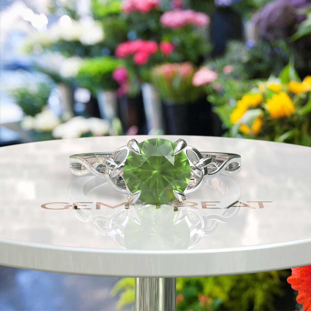 Green Gem Enigma: Round Peridot Solitaire in Celtic Silver Setting