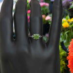 Load image into Gallery viewer, Green Gem Enigma: Round Peridot Solitaire in Celtic Silver Setting
