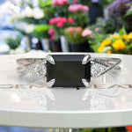 Load image into Gallery viewer, Dark Gem Allure: Emerald Cut 1.5ct Black Onyx Silver Ring with Artfully Twisted Shank
