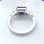 Load image into Gallery viewer, Enchanting Emerald Cut Blue Sapphire Ring - Twisted Band of Love
