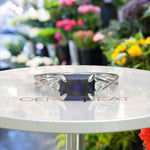 Load image into Gallery viewer, Enchanting Emerald Cut Blue Sapphire Ring - Twisted Band of Love
