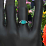 Load image into Gallery viewer, Timeless Turquoise: Emerald Cut Gemstone on a Spiraled Silver Band
