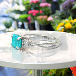 Load image into Gallery viewer, Timeless Turquoise: Emerald Cut Gemstone on a Spiraled Silver Band
