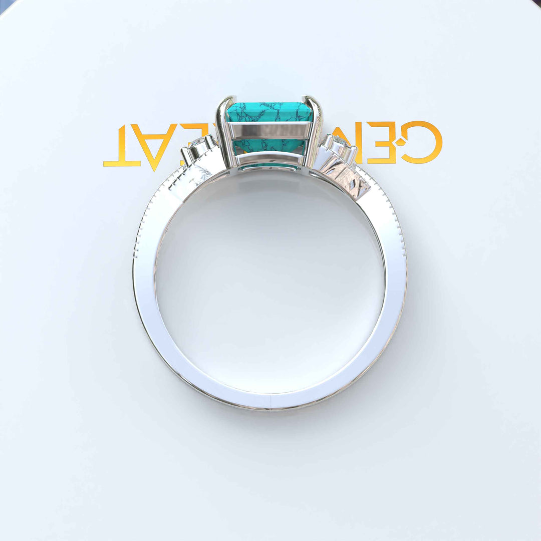 Timeless Turquoise: Emerald Cut Gemstone on a Spiraled Silver Band