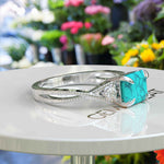 Load image into Gallery viewer, Timeless Turquoise: Emerald Cut Gemstone on a Spiraled Silver Band
