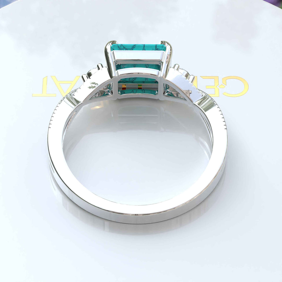 Timeless Turquoise: Emerald Cut Gemstone on a Spiraled Silver Band