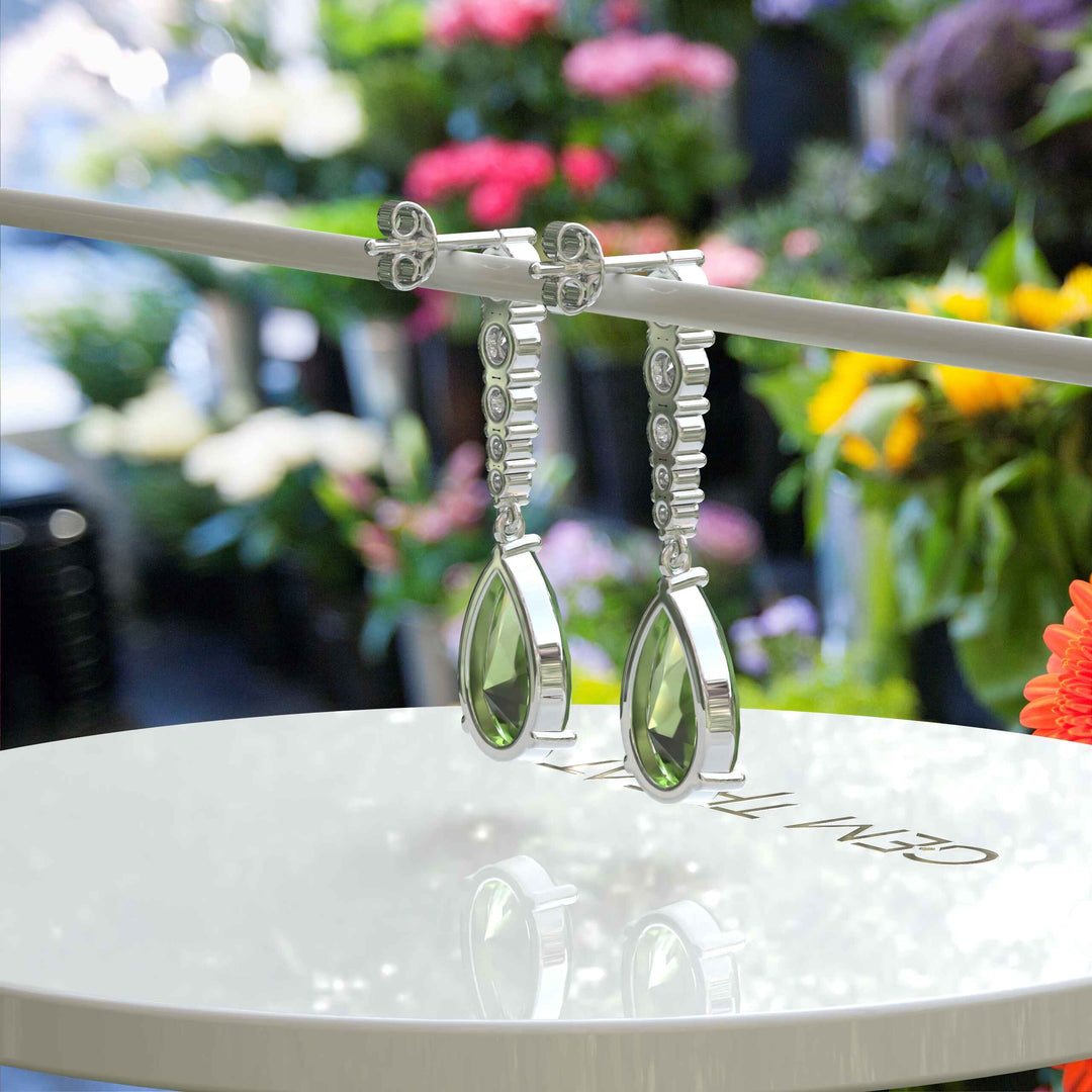 Ethereal Glow: Peridot Pear Drop Earrings with Moissanite Embellishments