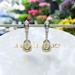 Load image into Gallery viewer, Mellow Radiance: Glistening Pear Cut Yellow Moissanite Drop Earrings.
