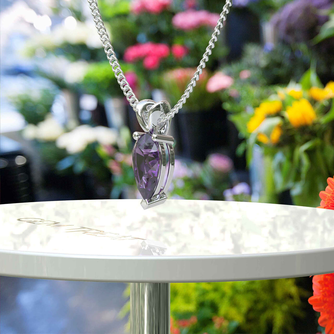 Jeweled Elegance Unleashed: Pear Cut Amethyst Stars in Our Solitaire Pendant Necklace Collection