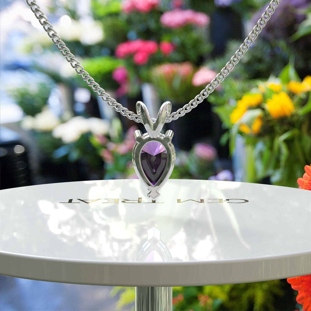 Jeweled Elegance Unleashed: Pear Cut Amethyst Stars in Our Solitaire Pendant Necklace Collection