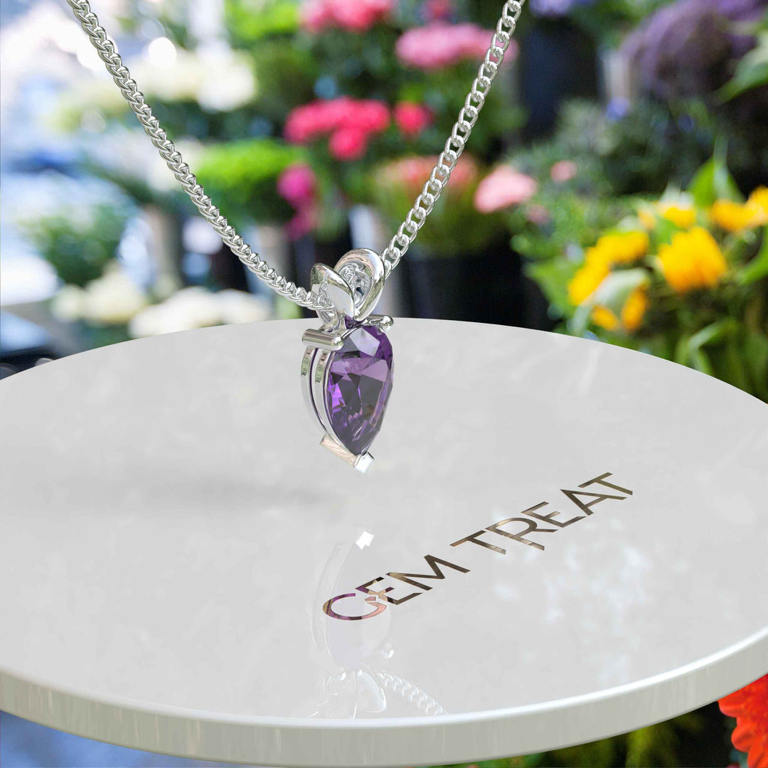 Jeweled Elegance Unleashed: Pear Cut Amethyst Stars in Our Solitaire Pendant Necklace Collection