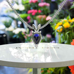 Load image into Gallery viewer, Graceful Allure: Pear Cut Blue Sapphire Solitaire Pendant Necklace Masterpiece
