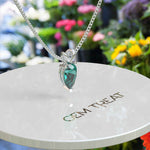 Load image into Gallery viewer, Regal Elegance: Solitaire Pear Cut Green Emerald Pendant Necklace, A Gem of Nature
