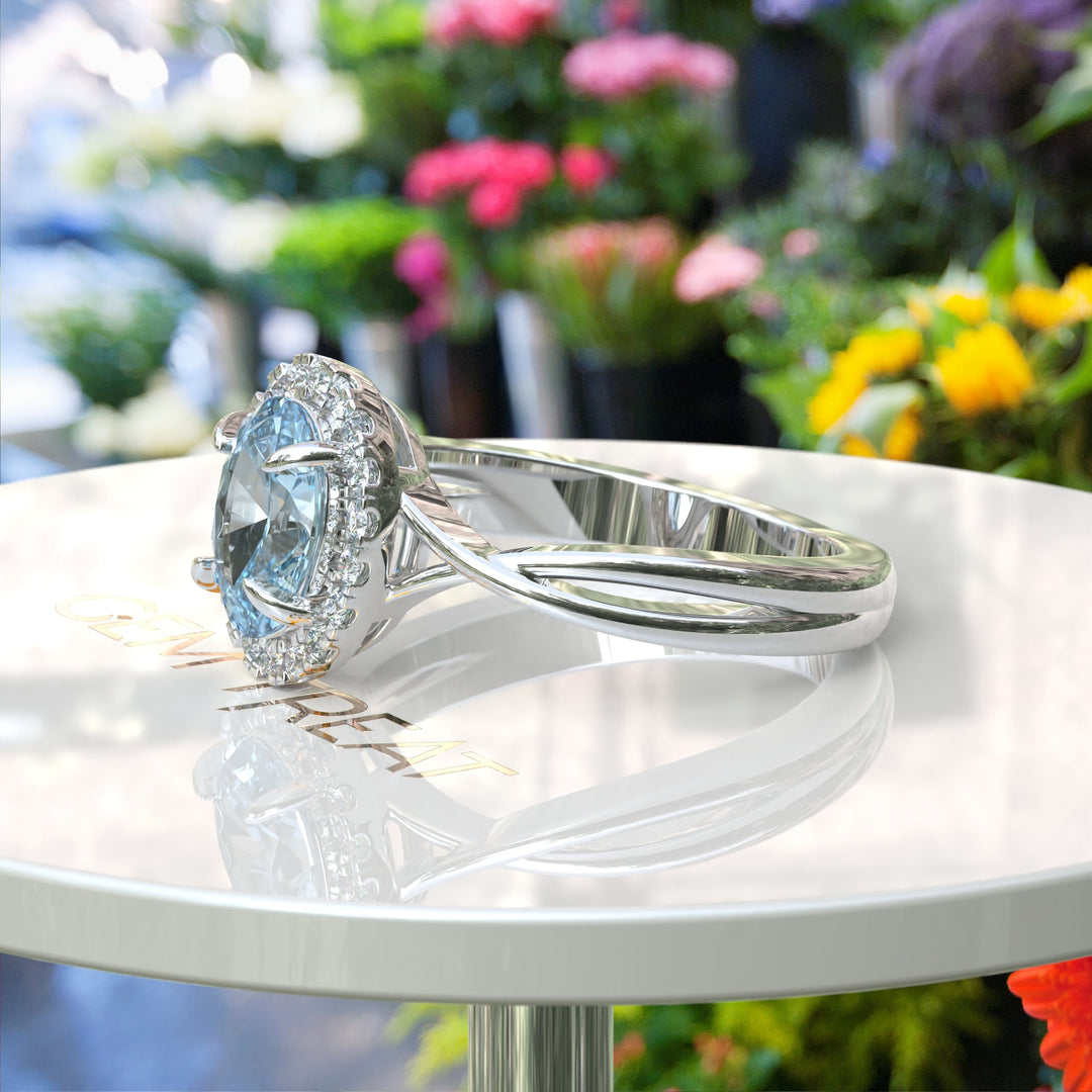 "Twisting Tides: Oval Aquamarine Ring with Moissanite Halo & Spiraled Shank