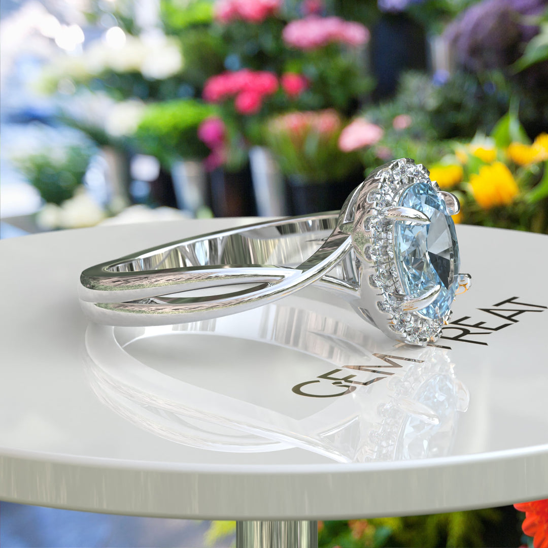 "Twisting Tides: Oval Aquamarine Ring with Moissanite Halo & Spiraled Shank