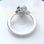 Load image into Gallery viewer, &quot;Twisting Tides: Oval Aquamarine Ring with Moissanite Halo &amp; Spiraled Shank
