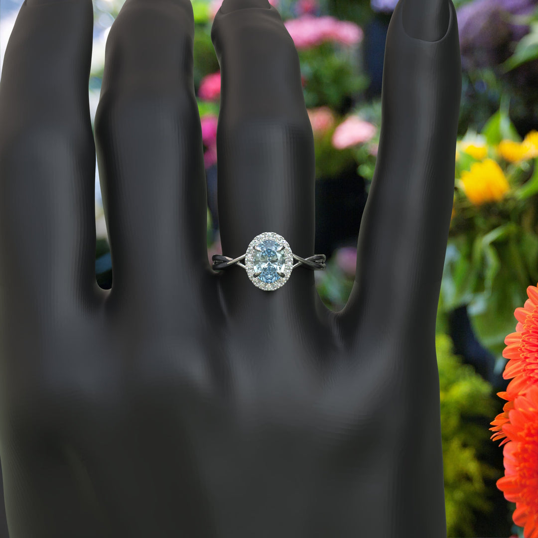 "Twisting Tides: Oval Aquamarine Ring with Moissanite Halo & Spiraled Shank