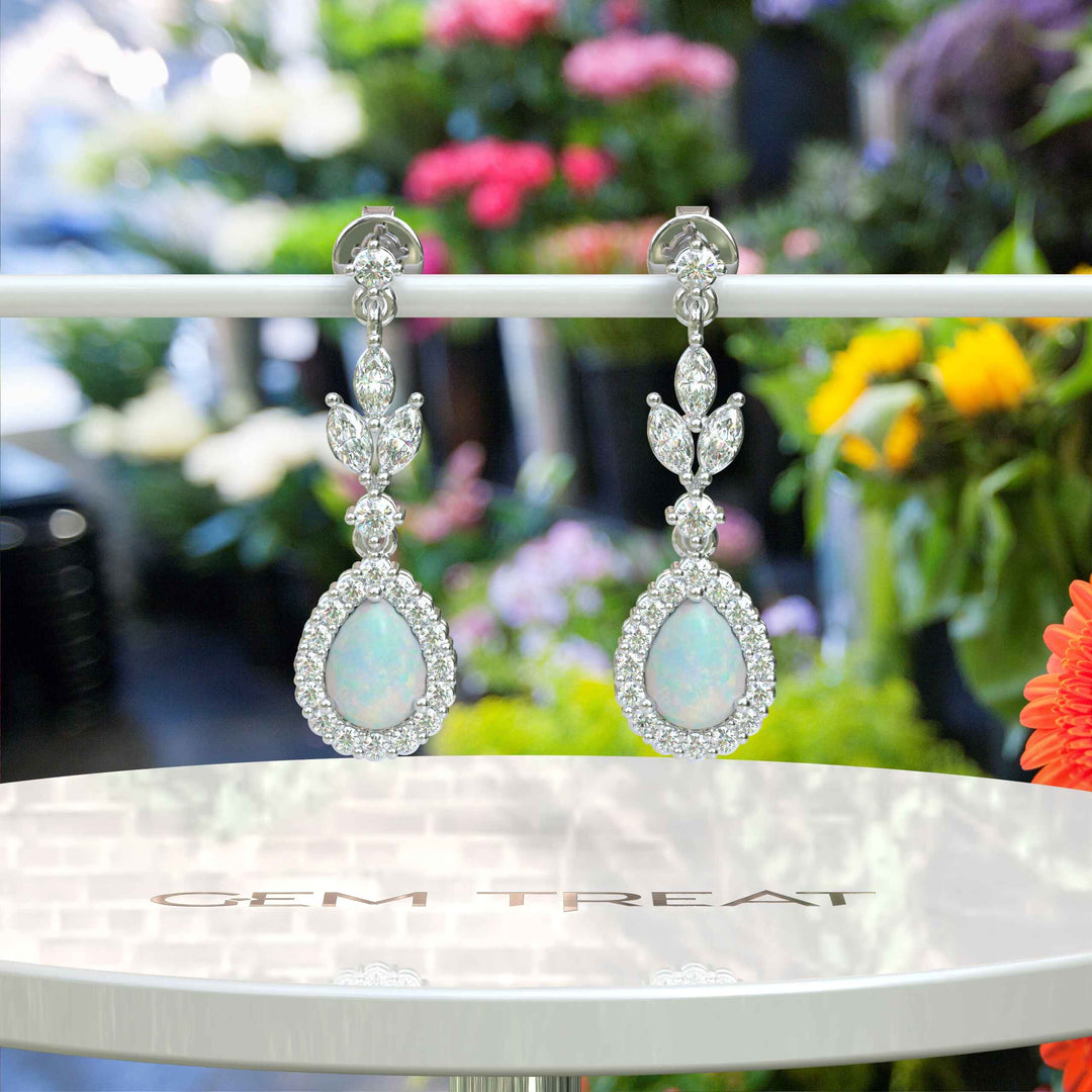 Galactic Beauty: Pear Cut Opal Earrings with Moissanite Halo, Drop Style.