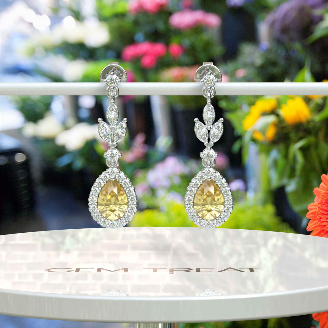 Golden Luster: Pear Cut Yellow Sapphire Halo Drop Earrings.