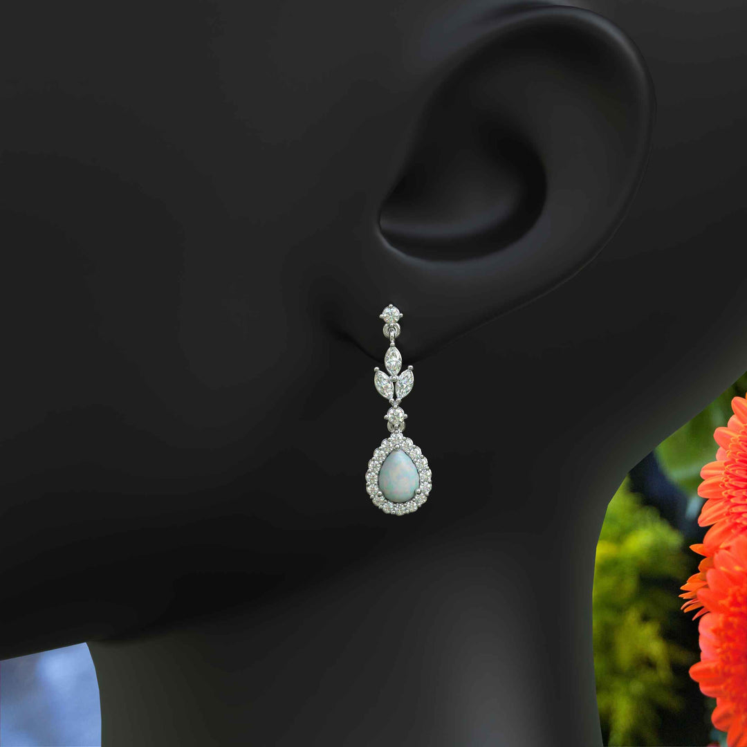 Galactic Beauty: Pear Cut Opal Earrings with Moissanite Halo, Drop Style.