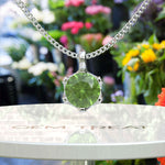 Load image into Gallery viewer, Jeweled Symphony: A Round Peridot Solitaire Pendant Necklace Awaits
