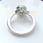 Load image into Gallery viewer, Green Oasis &amp; Spiraled Elegance: Halo Ring Spotlighting Oval Peridot with Twisted Shank
