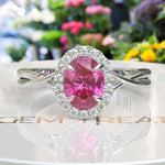 Load image into Gallery viewer, Celebrate Love with Sparkling Halo: Oval Pink Sapphire Ring with Twisted Shank
