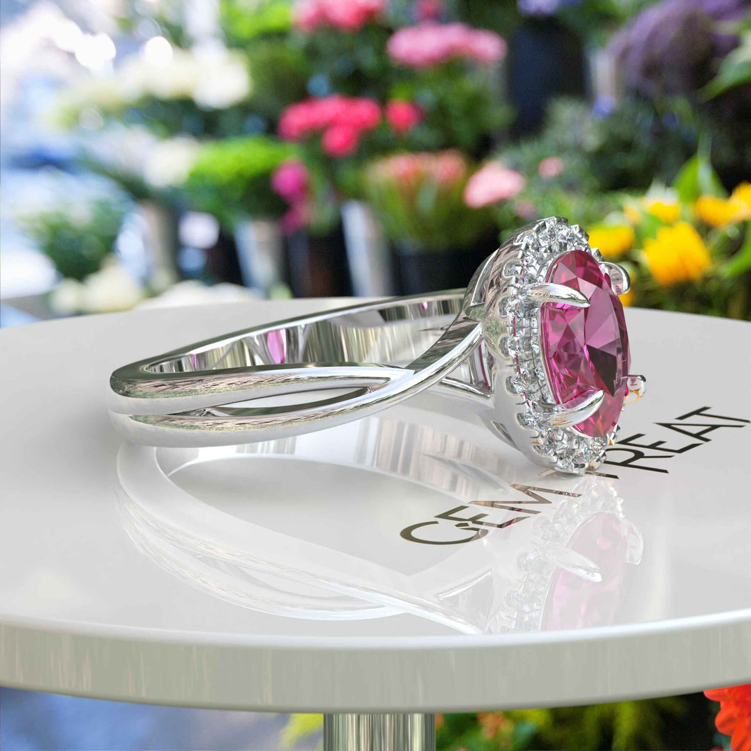 Celebrate Love with Sparkling Halo: Oval Pink Sapphire Ring with Twisted Shank