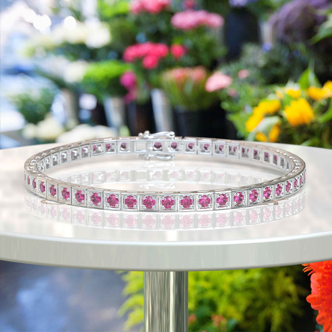 Elegance Unleashed: Round Pink Sapphire Tennis Bracelet Masterpiece