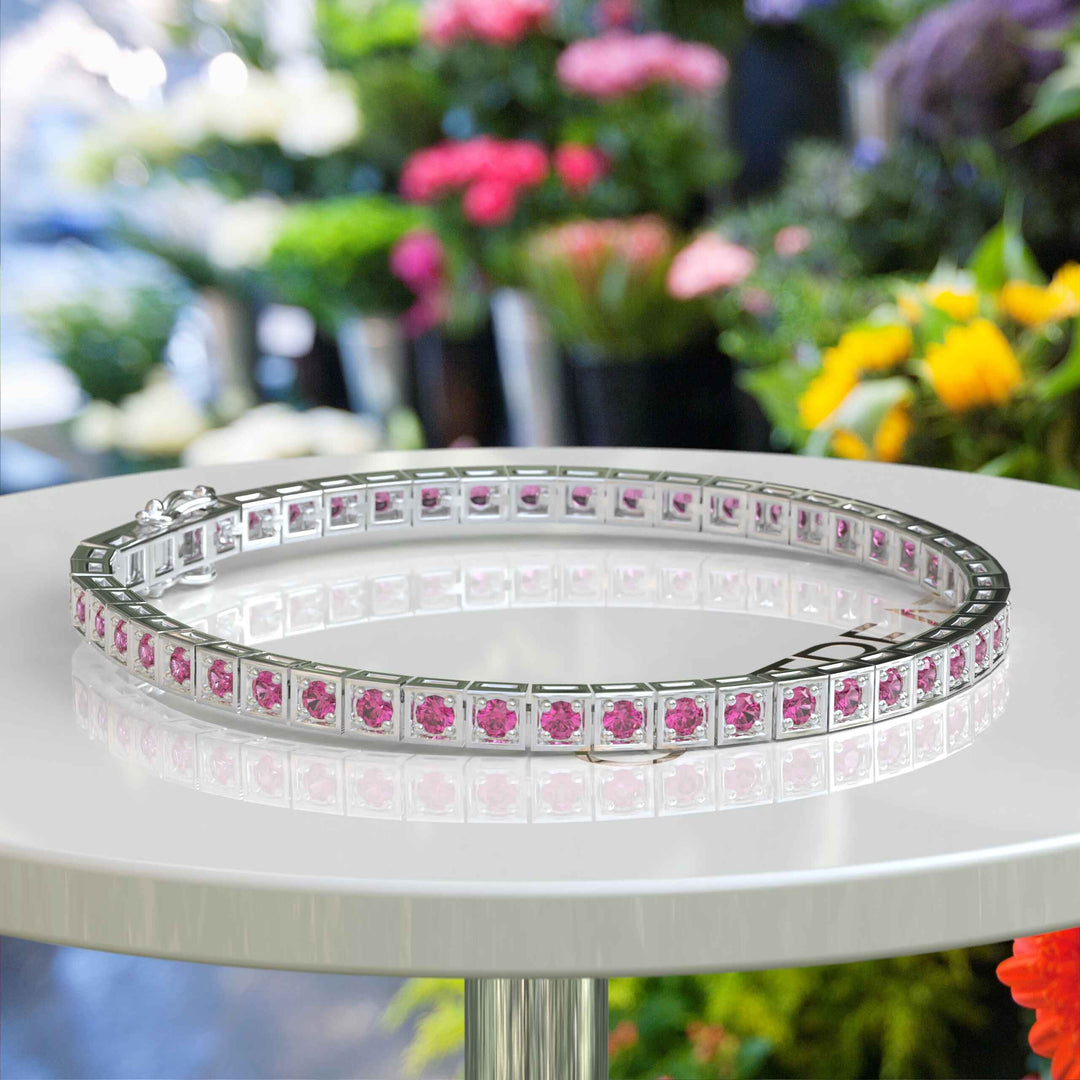 Elegance Unleashed: Round Pink Sapphire Tennis Bracelet Masterpiece