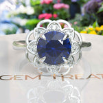 Load image into Gallery viewer, Deep Azure Dream: Round London Blue Topaz Ring with Moissanite Halo Brilliance
