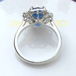 Load image into Gallery viewer, Deep Azure Dream: Round London Blue Topaz Ring with Moissanite Halo Brilliance
