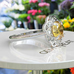 Load image into Gallery viewer, Sapphire Splendor: Floral Round Yellow Sapphire Halo Ring
