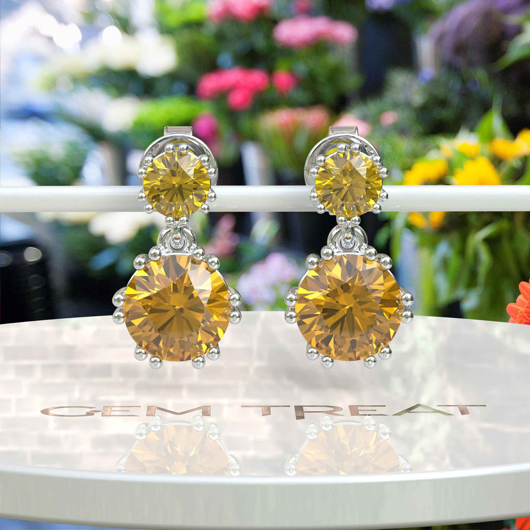 Sunburst Splendor: Delicate Round Citrine Drop Earrings for Enchanting Charm.