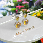 Load image into Gallery viewer, Sunburst Splendor: Delicate Round Citrine Drop Earrings for Enchanting Charm.
